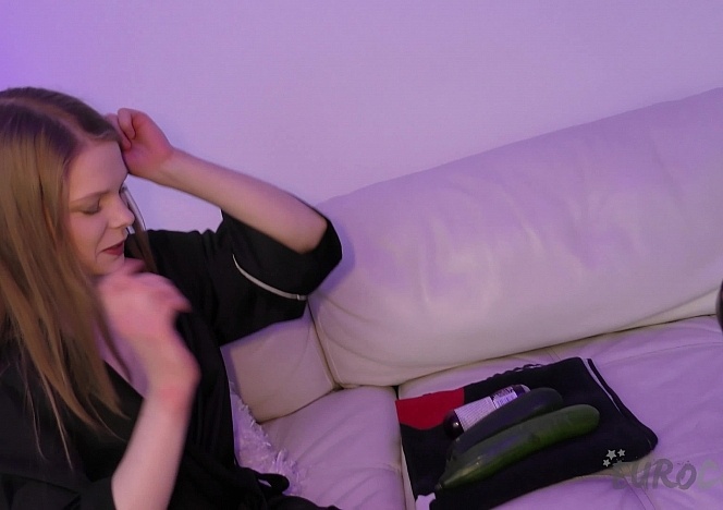 011322_tiny_spinner_model_lolly_masturbating_on_the_white_casting_couch_with_zucchini_and_cucumbers_stretching_her_small_slit