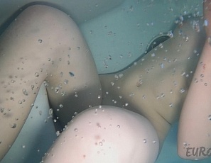 021622_snow_day_in_the_jacuzzi_with_petite_model_lolly_underwater_glass_dildo_in_her_mouth_and_pussy